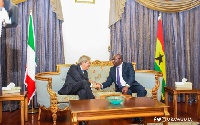 The Italian Prime Minister in a handshake with Vice-President Dr Mahamudu Bawumia