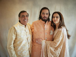 Mukesh Ambani with his son, Anant Ambani and wife, Radikah Merchant