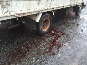 Blood dripping from bodies being conveyed to the morgue