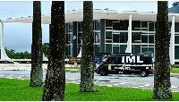 Brazil forensic team is seen outside the Three Powers Square in Brasilia on November 14