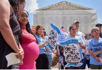 People protest in support of birthright citizenship outside of the Supreme Court in Washington, DC