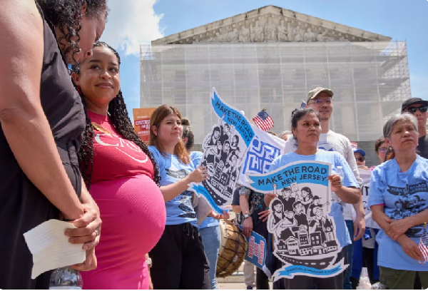 People protest in support of birthright citizenship outside of the Supreme Court in Washington, DC