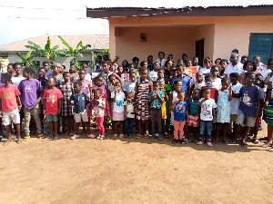 A section of the beneficiaries in a group photograph