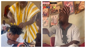 The chief (R) ordered for the young man's hair to be trimmed while mediating a dispute