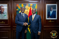 Dr Cassiel Ato Forson, Minister of Finance (R) and IFC Managing Director, Makhtar Diop (L)