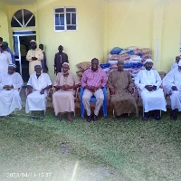 The MP for Ellembelle constituency (middle) with some elders of the Muslim community