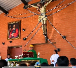 Christ on chains, priest in a helmet after Ecuador Catholic Father's death