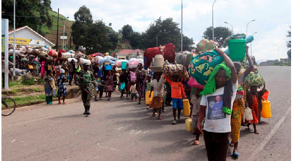 Congolese refugees cross the Bunagana border into Uganda