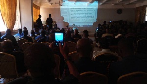 Some police officers took out their mobile phones to take pictures of the statements