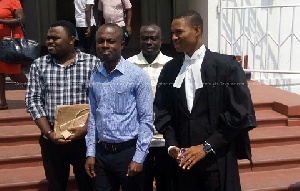 Eric Asante, a 40-year-old teacher with his lawyer, others