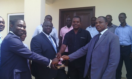 ASN Construction Limited staff handing over houses