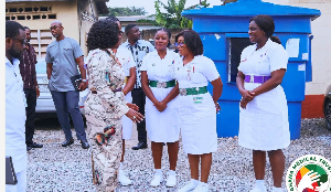 Ghana Medical Trust Fund Administrator Adjoa Obuobia Darko-Opoku speaking with some nurses