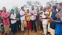 Emmanuel Armah-Kofi Buah with some residents of Ellembelle at the ceremony