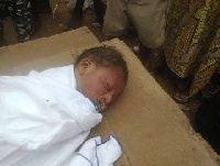 3-day old baby left at refuse site by mother