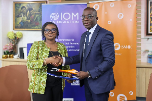 L–R: Fatou Diallo Ndiaye, IOM's Chief of Mission for Ghana and Julian Opuni, Fidelity Bank Director