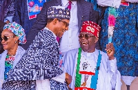 Buhari with president-elect Tinubu at Lagos rally, Mrs Tinubu is in the background