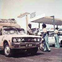 Fuel attendants at an AGIP station in 1970s