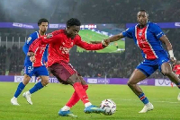 Ernest Nuamah (in red jersey) featured in Lyon's defeat against PSG
