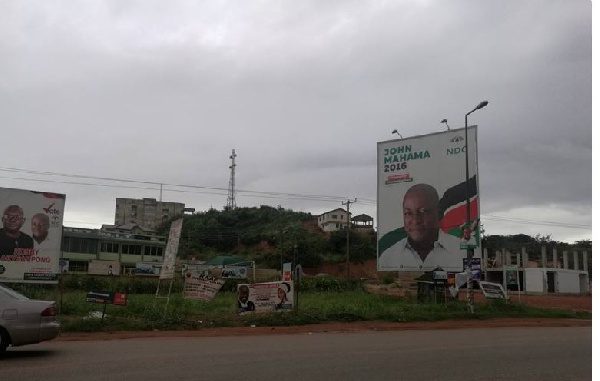 NDC billboards at the entrance of the University of Cape Coast.