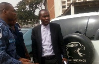 Anthony Anyomi in suit