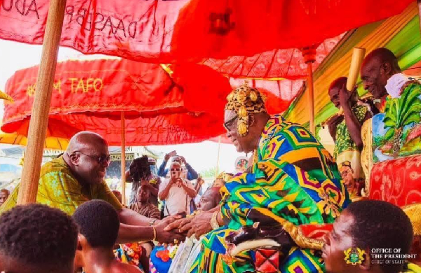 Chief of Staff, Julius Debrah [L] shaking hands with Daasebre Adusei Peasah IV