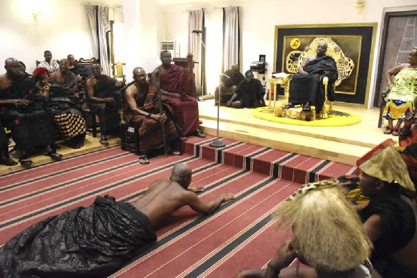 Nana Boakye Darkwa on the floor begging Okyenhene after being destooled