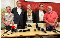Survivors of abuse by members of the French clergy  pose together during a news conference