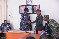 IGP exchanging pleasantries with some heads of the army