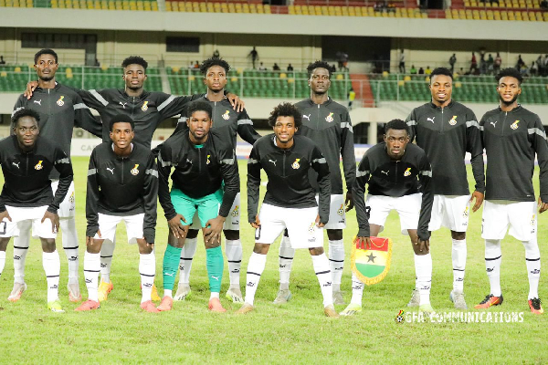 The Black Satellites team pose for a picture before a game