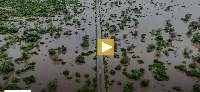 Flood waters cover the Chibuto-Chaimite road in Gaza province, Mozambique, Saturday, Jan. 17, 2026