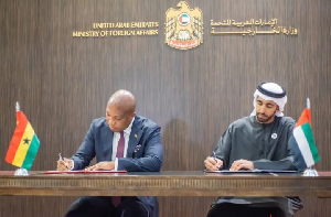 Okudzeto Ablakwa [L] and UAE official signing a document