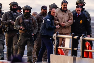 Venezuelan leader Nicolás Maduro being escorted to court on Monday