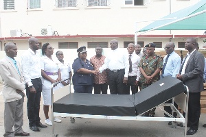 DCOP Dr Tetteh-Korboe thanking Harry Sitim Aboagye after receiving beds on behalf of the hospital