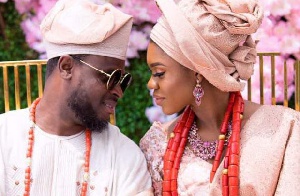 Becca with her husband, Tobi during their wedding