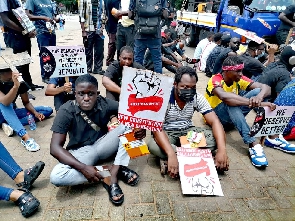 Activists at the #OccupyJulorbiHouse protest