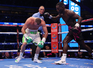 Hutchinson bows down after a punch from Buatsi