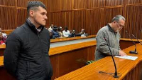 Adrian de Wet (L) will take the stand against his boss Zachariah Johannes Olivier (R)