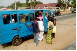 Passengers getting on a bus