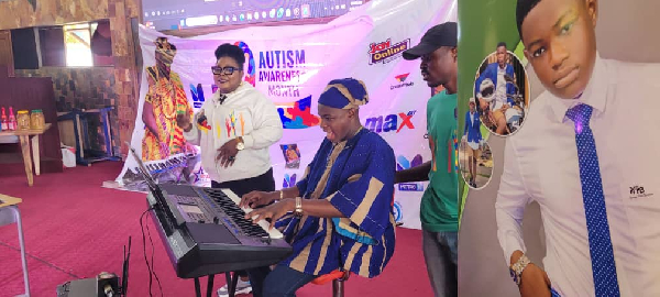 The young Phil trying his hands on the keyboard during the event