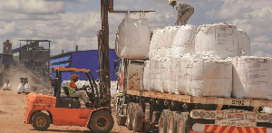 Workers load lithium concentrate at Prospect Lithium mine in Goromonzi, Zimbabwe, on Jan. 9, 2024