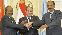 Eritrea's President Afwerki (R), Egyptian counterpart Fattah al-Sisi (C), Somalia's Hassan  (L)