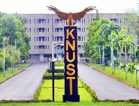 Photo of monument in front of main library of KNUST campus