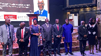 Paul Baffoe-Bonnie among other dignitaries in a photograph during the event