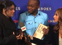 Iman Vellani, Osei Boateng and a CNN journalist (L-R)