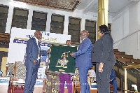 Ambassador D.K. Osei receivng the award