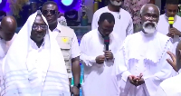 Dr. Bawumia and Prophet Adom Kyei Duah  surrounded by pastors