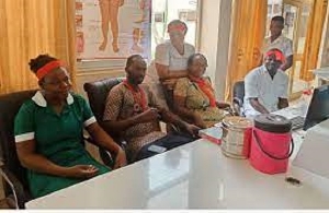 Nurses And Midwives In Upper East Work In Red Bands  0