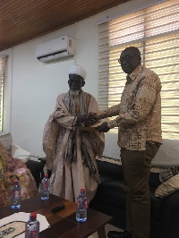 National Chief Imam presenting the petition to the Interior Minister, Ambrose Derry