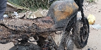 The incident resulted in the destruction of a shop and two motorbikes