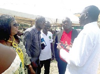 Dr Ato Duncan (R) and Mrs Anastasia Thomford Okyere (L) in a chat with other guests at the event